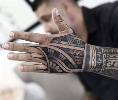 polynesian hand tattoo